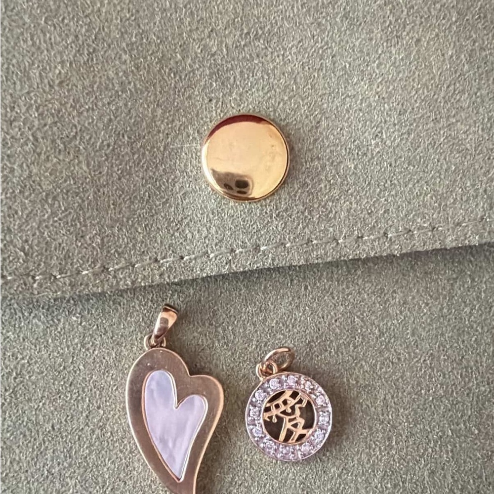 14k yellow gold Symbol of love (Chinese) charm by Mary margrill